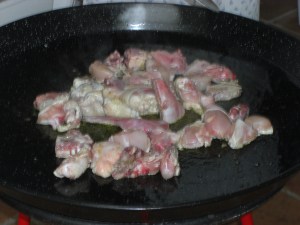 The oil has been heated and the meat is now added.