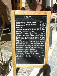 The menu board at Aries